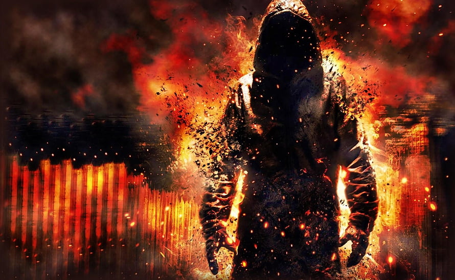 Hooded Figure Enveloped in Flames and Embers Amidst Destruction HD wallpaper