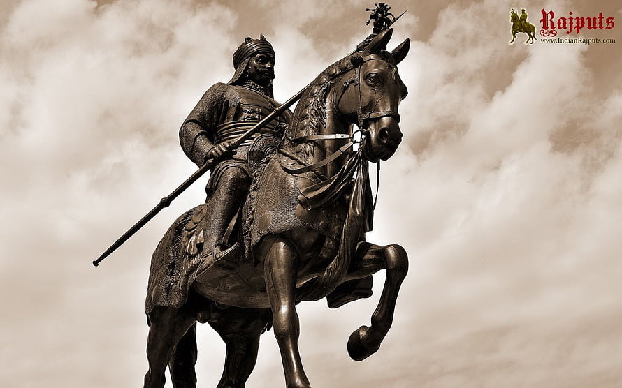 Bronze Statue of Maharana Pratap on Horseback with Lance Against Dramatic Sky HD wallpaper
