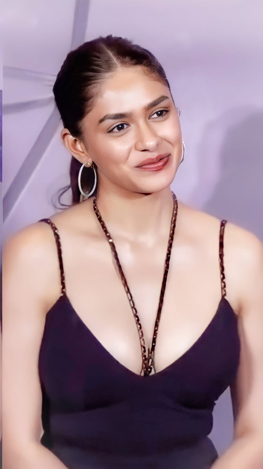 Mrunal Thakur in Black Spaghetti Strap Dress with Gold Hoop Earrings HD phone wallpaper