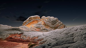 Desert Rock Dome Under Starry Night Sky with Warm Interior Glow HD wallpaper
