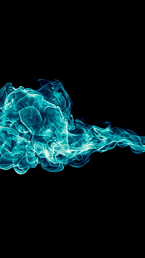 Vibrant Turquoise Smoke Plume Swirling Against a Deep Black Background HD phone wallpaper