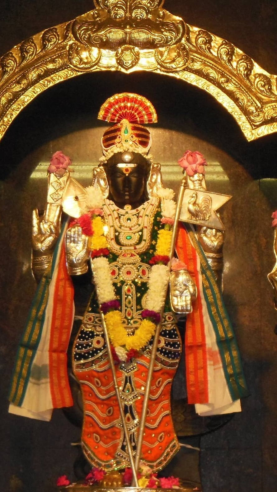 Lord Murugan Temple Deity Adorned in Gold and Flowers HD phone wallpaper