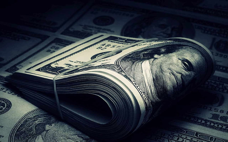Stack of One Hundred Dollar Bills in Dark Moody Lighting HD wallpaper