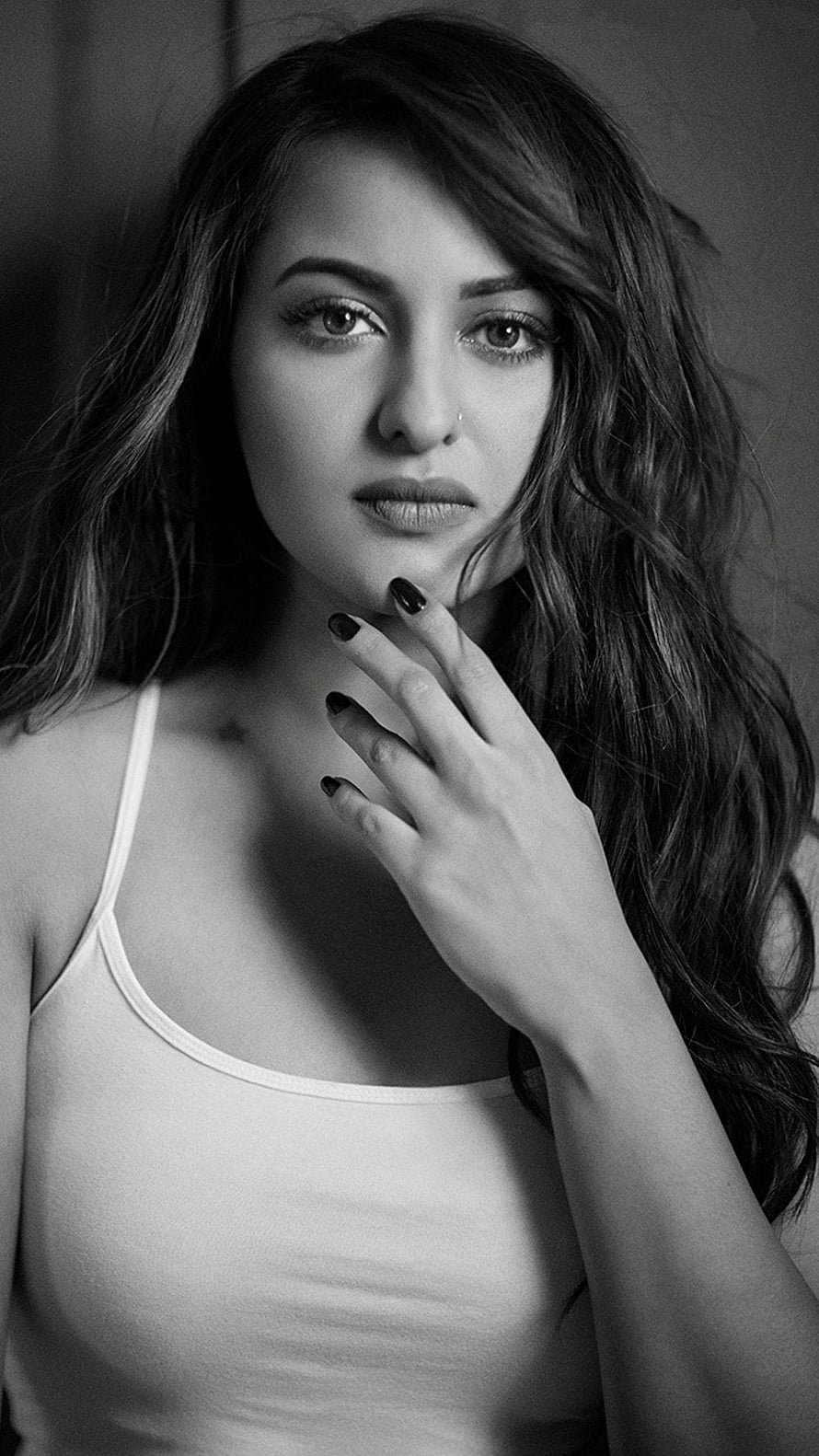 Sonakshi Sinha Black and White Portrait with Hand on Chin HD phone wallpaper