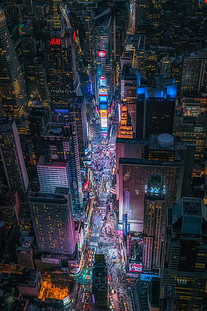 Aerial Night View of Times Square Manhattan with Glowing Neon Billboards and City Lights HD phone wallpaper