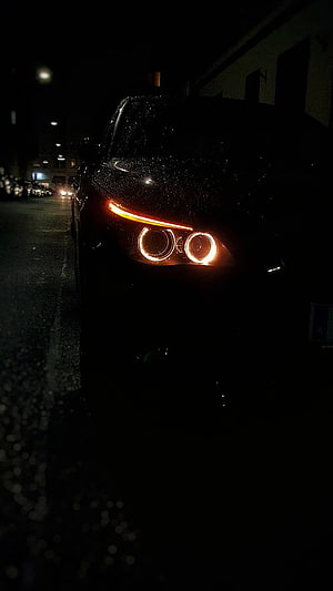BMW E60 Headlights Glowing in the Dark Rainy Night Street Scene HD phone wallpaper