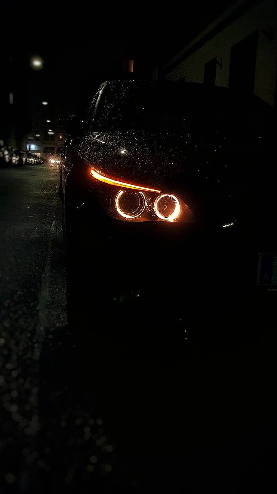 BMW E60 Headlights Glowing in the Dark Rainy Night Street Scene HD phone wallpaper