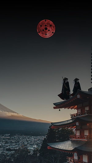 Itachi and Kisame Silhouetted on Pagoda Roof with Tsukuyomi Moon Over Mt. Fuji HD phone wallpaper