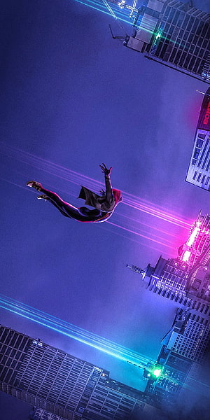 Miles Morales swinging through a neon-lit futuristic cityscape at night HD phone wallpaper