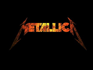 Metallica Band Logo in Fiery Orange and Black Grunge Style HD wallpaper