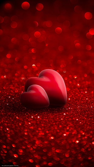 Glossy Red Heart on Sparkling Glitter Surface with Bokeh Light Background HD phone wallpaper