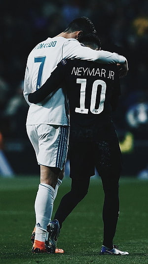Cristiano Ronaldo and Neymar Jr Embrace on the Pitch in a Moment of Sportsmanship HD phone wallpaper