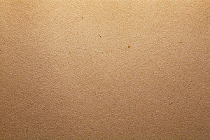 Natural Brown Kraft Paper Texture With Visible Fibers And Organic Surface Detail HD wallpaper