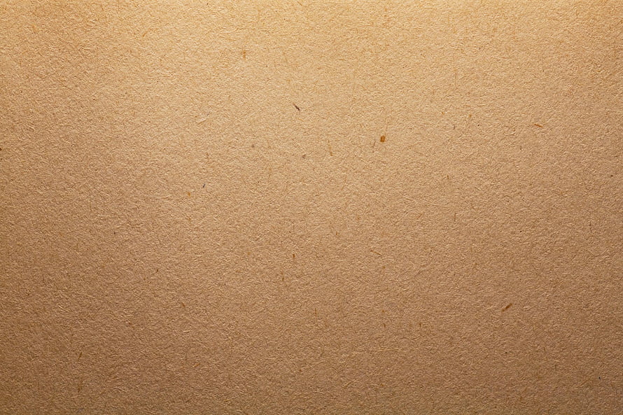 Natural Brown Kraft Paper Texture With Visible Fibers And Organic Surface Detail HD wallpaper