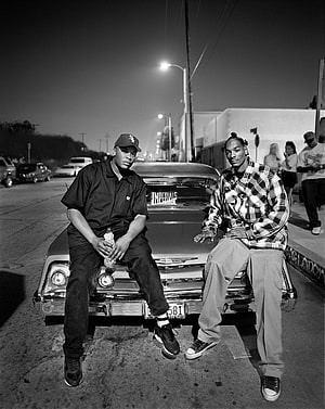 Snoop Dogg and Young Snoop Dogg Sitting on a Classic Car at Night in Black and White HD phone wallpaper