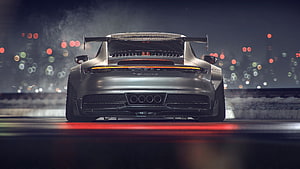 Rear View of a Silver Porsche 911 GT3 RS with Large Rear Wing on a Night Track HD wallpaper