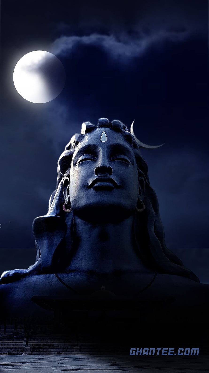 Adiyogi Shiva Statue Under a Full Moon with Crescent Adornment and Serene Expression HD phone wallpaper