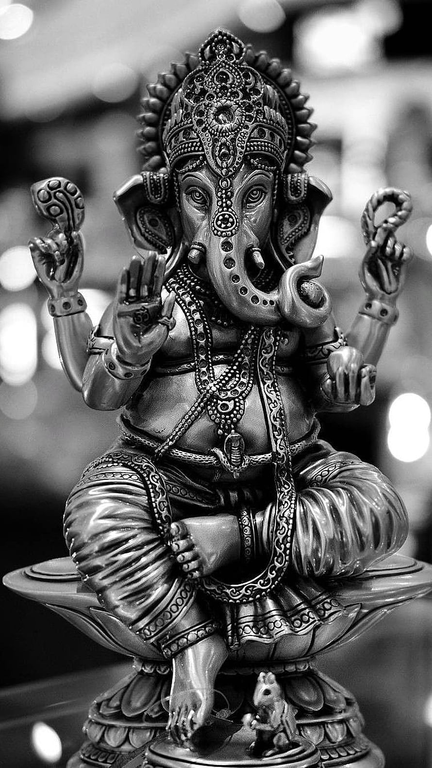 Black and White Ganesha Statue on Lotus Pedestal with Mouse Companion HD phone wallpaper