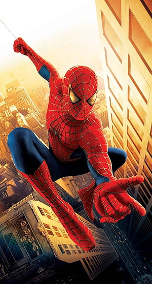 Spider-Man Swinging Through Golden City Skyline in Classic Red and Blue Suit HD phone wallpaper