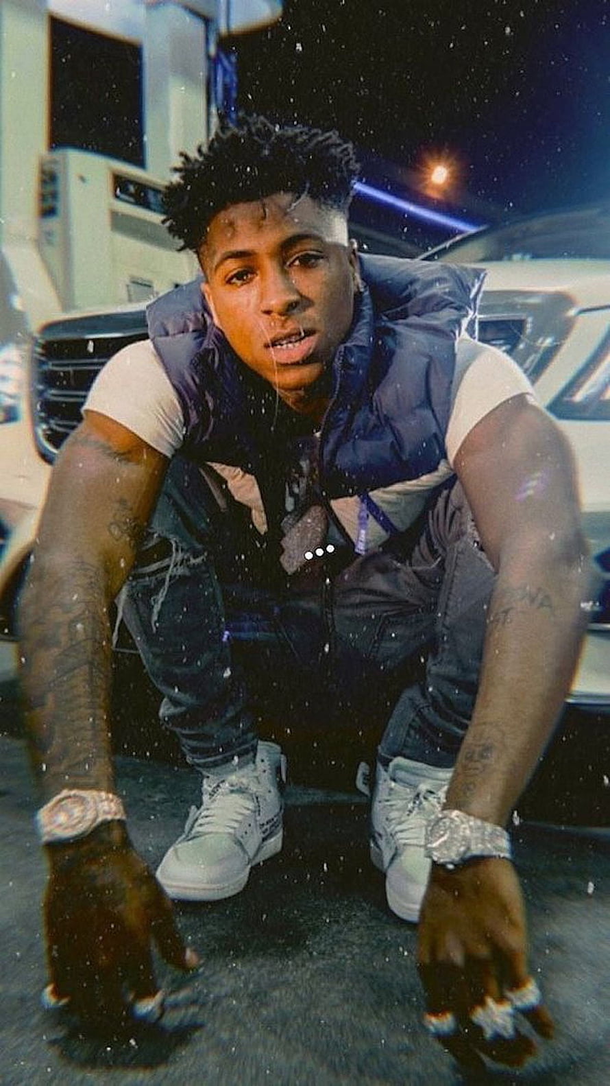 NBA YoungBoy Crouching in Front of Luxury SUV at Night with Snow Effect HD phone wallpaper