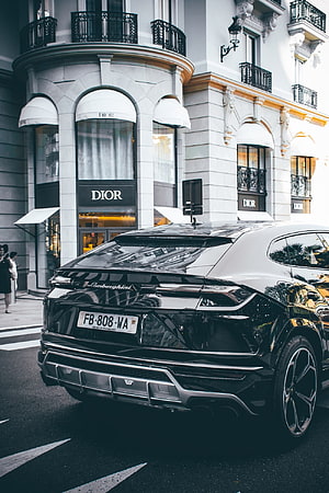 Black Lamborghini Urus Rear View Parked Outside Dior Boutique in Paris HD phone wallpaper