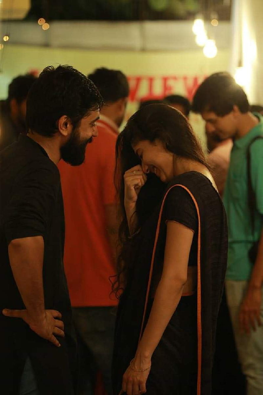 Sai Pallavi and Nivin Pauly share a candid moment in the Malayalam film Premam HD phone wallpaper