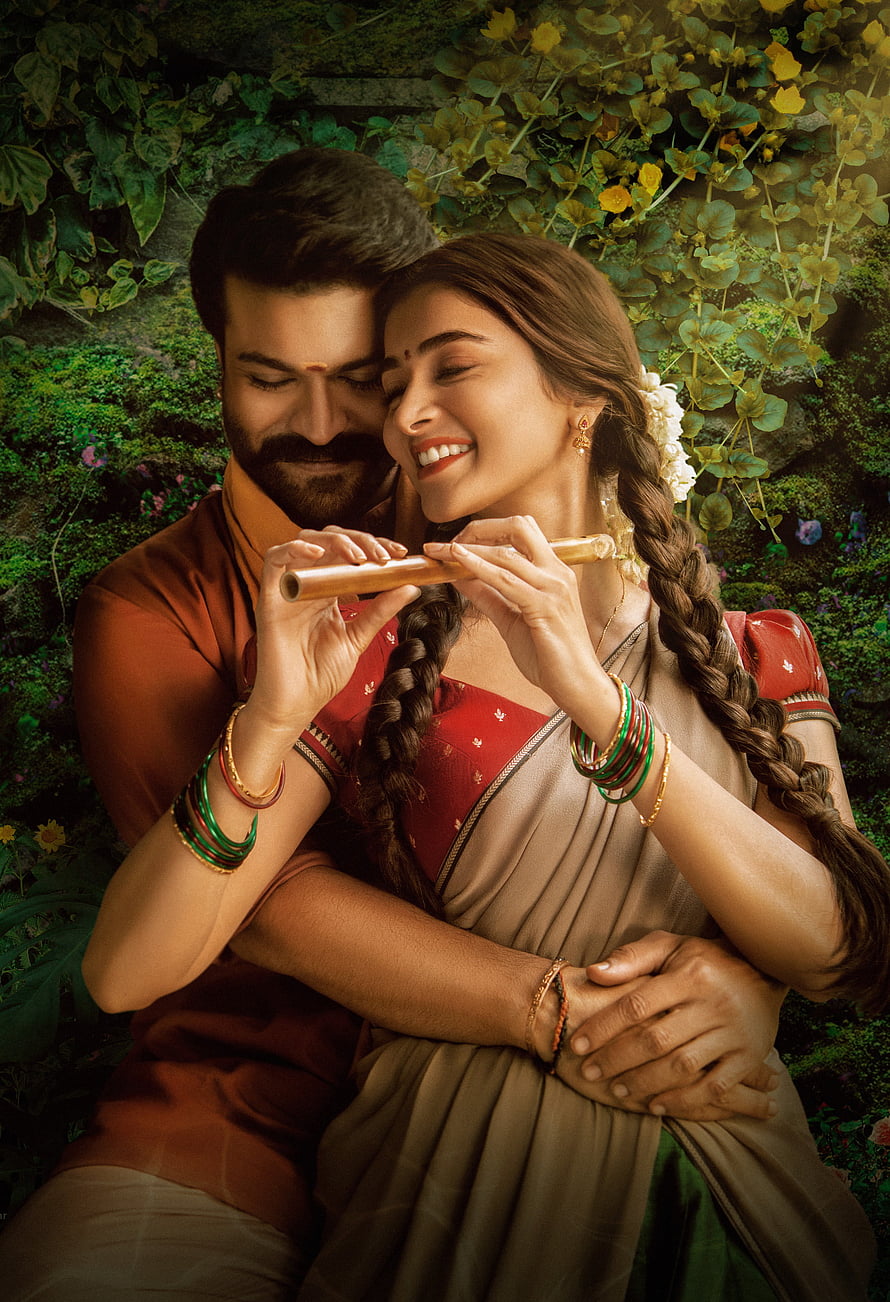 Ram Charan and Pooja Hegde in romantic pose with bamboo flute in lush garden setting HD phone wallpaper