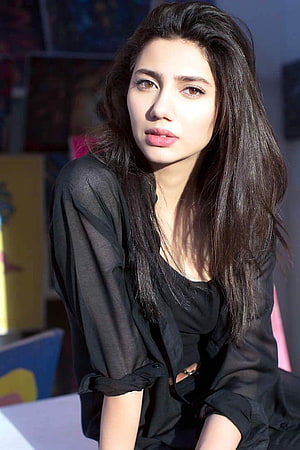 Mahira Khan in a Black Blouse with Long Dark Hair and Soft Studio Lighting HD phone wallpaper