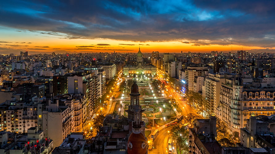 Buenos Aires Cityscape at Dusk with Glowing Streets and Historic Architecture HD wallpaper
