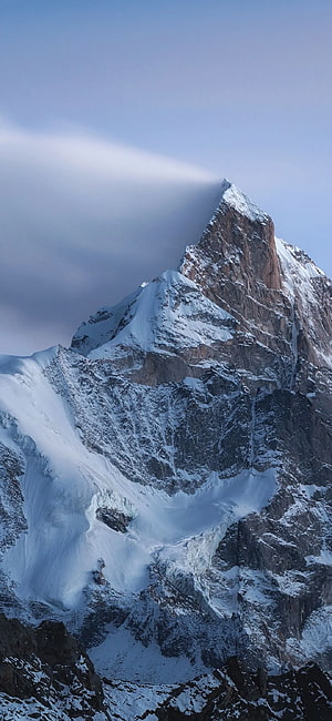 Majestic Snow-Capped Mountain Peak with Dramatic Clouds and Glaciers HD phone wallpaper