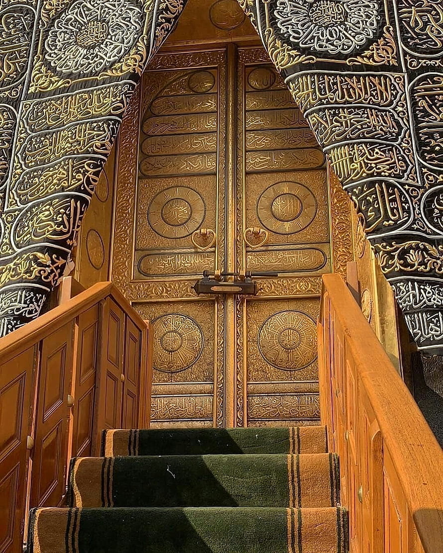 Ornate Golden Kaaba Door with Arabic Calligraphy and Carpeted Staircase HD phone wallpaper