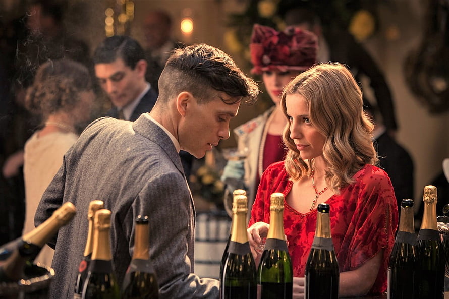 Tommy Shelby and Grace at a Champagne Bar in Peaky Blinders HD wallpaper