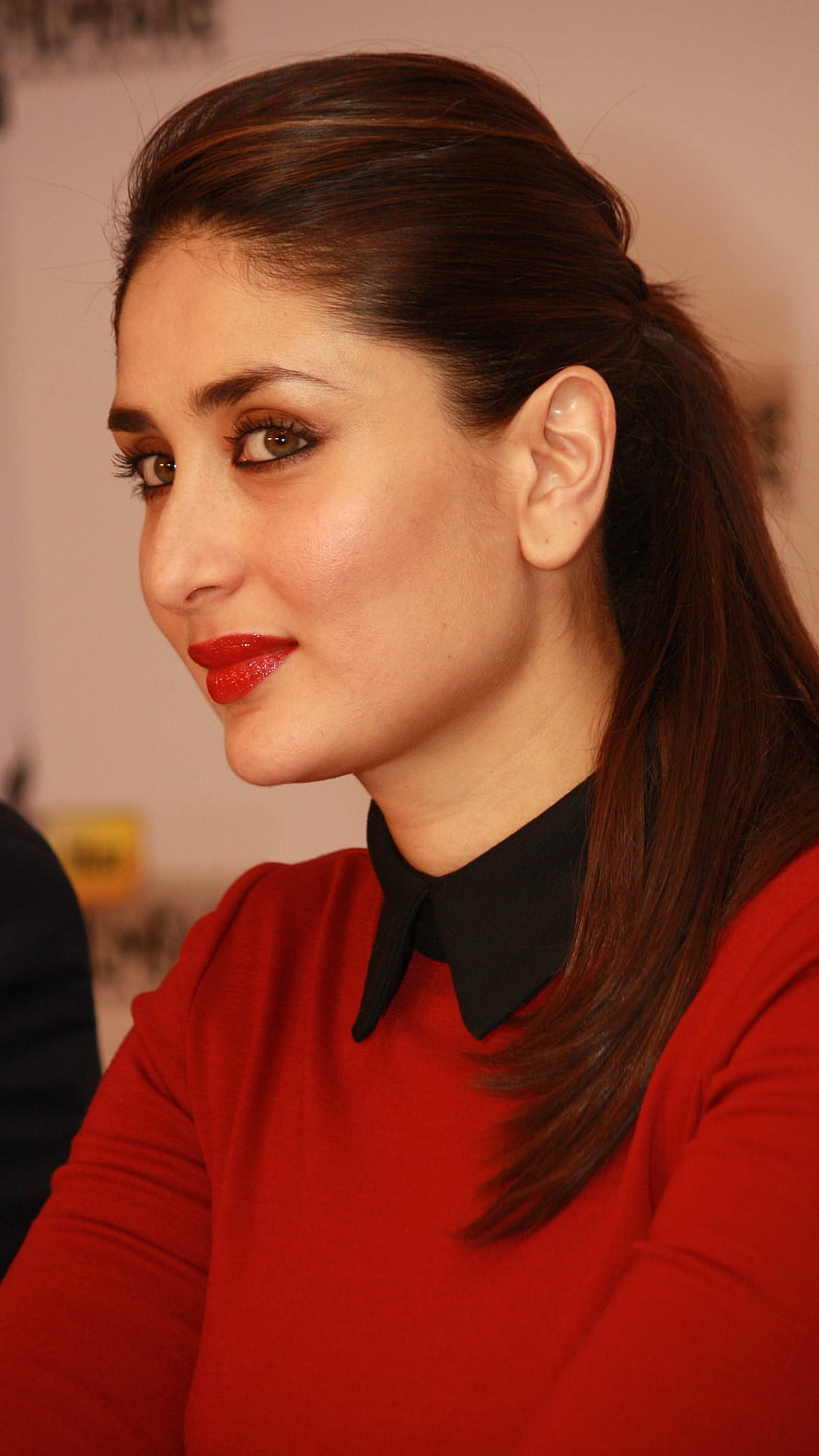 Kareena Kapoor in a red top with black collar and bold red lipstick HD phone wallpaper