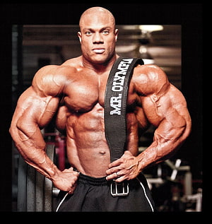 Phil Heath Mr Olympia Bodybuilding Pose with Weightlifting Belt in Gym HD phone wallpaper