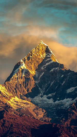 Annapurna Mountain Peak in Nepal's Himalayas at Golden Hour HD phone wallpaper