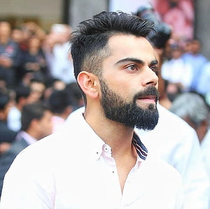 Virat Kohli Profile Portrait With Full Beard And Styled Hair HD wallpaper