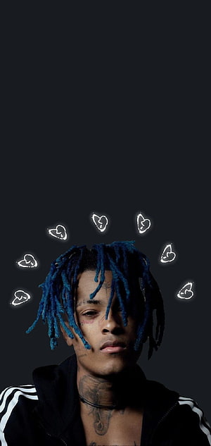 XXXTentacion Portrait With Blue Dreadlocks And Glowing Heart Halo On Dark Background HD phone wallpaper