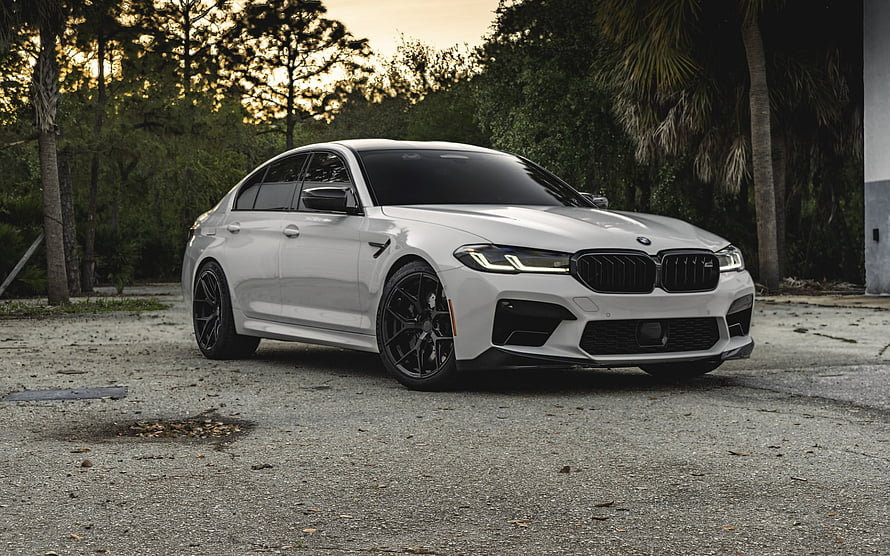 White BMW M5 F90 Sedan Parked on Gravel with Black Alloy Wheels HD wallpaper