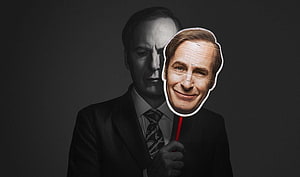 Better Call Saul promotional art featuring a man holding a character mask against a dark background HD wallpaper