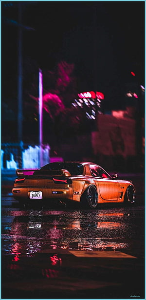 Mazda RX-7 JDM Night Drive on Wet Streets with Neon City Lights HD phone wallpaper