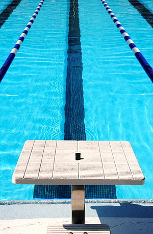 Olympic Swimming Pool Starting Block with Lane Lines and Turquoise Water HD phone wallpaper