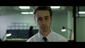 Edward Norton in Fight Club cinematic office scene with moody green lighting HD wallpaper