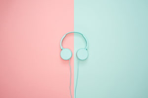 Mint Headphones on Split Pastel Pink and Mint Background HD wallpaper