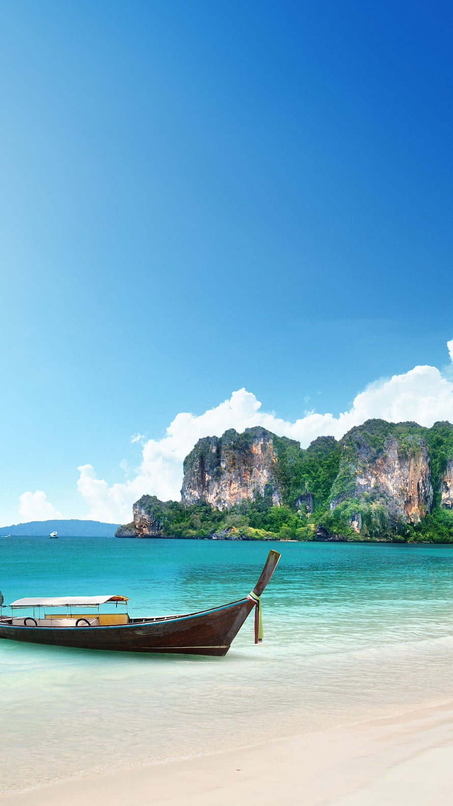 Traditional Thai Longtail Boat on a Turquoise Beach with Limestone Cliffs in the Background HD phone wallpaper
