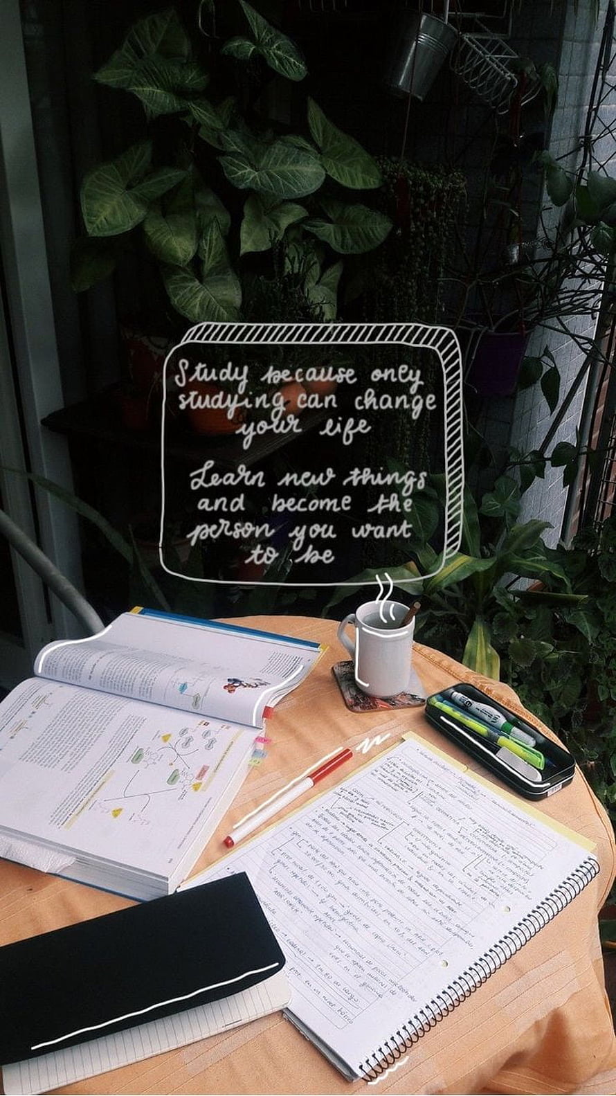 Cozy Study Desk Setup with Open Books, Handwritten Notes, and Motivational Quote Overlay HD phone wallpaper