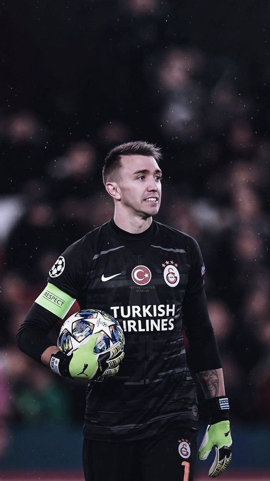 Fernando Muslera in Galatasaray Goalkeeper Kit Holding Champions League Ball HD phone wallpaper