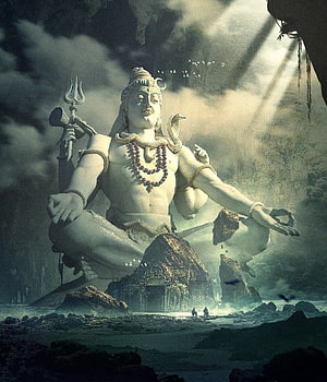 Colossal Shiva Statue in Meditative Pose Amidst Misty Caves and Divine Light HD phone wallpaper