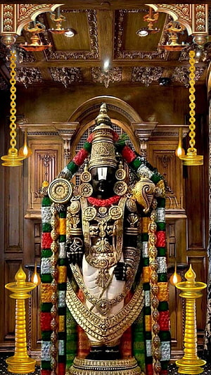 Ornate Lord Venkateswara Temple Idol with Gold Jewelry and Flower Garland HD phone wallpaper
