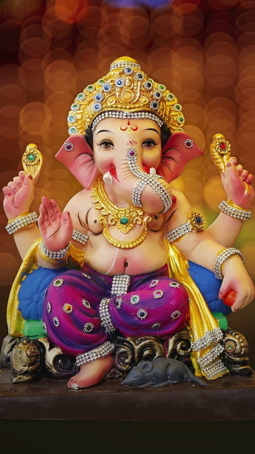 Ornate Lord Ganesha Idol With Jeweled Crown And Mouse Vahana On Decorative Pedestal HD phone wallpaper