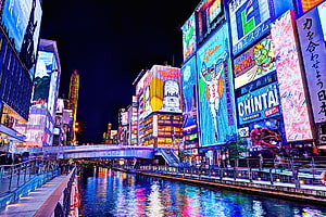 Osaka Dotonbori Canal at Night with Vibrant Neon Billboards and Reflections HD wallpaper